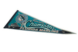 Angled view of vintage Florida Marlins 1997 pennant with teal, white, and black logo.