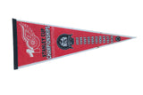 Vintage Detroit Red Wings red felt pennant listing Stanley Cup Championship years and team logo.