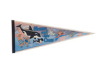 Vintage Shamu and his Crew felt pennant with colorful retro cartoon graphics of sea animals.