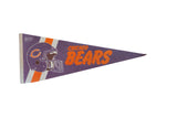 Vintage Chicago Bears felt pennant in purple, orange, and white, with subtle patina, 12x29.