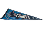 Vintage Vancouver Canucks felt pennant with blue orca logo and white stitched edge.