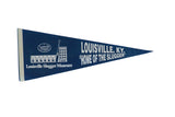Vintage Louisville Slugger Museum felt pennant in blue with white lettering and graphics.
