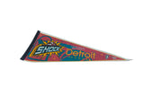 Detroit Shock felt pennant featuring a bold 1990s red, teal, and yellow graphic.