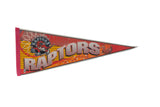 Circa 1990s Toronto Raptors felt pennant with dinosaur logo, red, yellow, and grey.