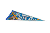 Vintage Toronto Blue Jays felt pennant viewed from an angle, showing its classic team graphics.