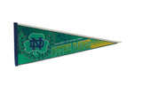 Green and gold Notre Dame felt pennant with Fighting Irish mascot and ND logo, 12x30 inches.