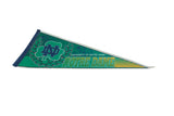 Vintage Notre Dame felt pennant showing green ND logo, text, and striped tip.