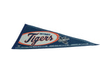 Close-up of the Detroit Tigers script logo and 2003 Interleague Play emblem on the vintage blue felt pennant.