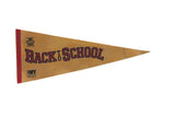 Faded orange Back to School (Film) felt pennant with red lettering and aged texture.