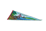 Vintage San Francisco felt pennant seen from an angle, highlighting its colorful bridge design.