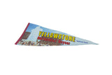 Vintage Yellowstone pennant graphic with bold yellow and red text over Old Faithful geyser.
