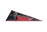 Red and black felt pennant with Scotty Bowman's portrait, signature, and career stats.