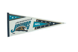 Vintage Jacksonville Jaguars felt pennant with teal, black, gold jaguar logo, and stars.