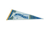 White felt, player silhouette, and blue Mariners lettering on vintage pennant.