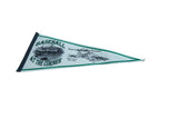 Detail of vintage felt pennant showing 'Baseball at the Corner' text and stadium image.