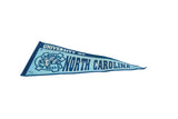 Vintage North Carolina Tar Heels felt pennant design with ram logo and blue lettering.
