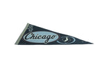 Overhead view of a vintage Chicago White Sox felt pennant's classic logos and script.