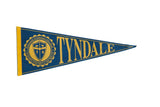 Vintage Tyndale College felt pennant in deep blue with golden yellow lettering and school crest.