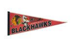 Vintage Chicago Blackhawks red felt pennant with classic team logos from the 1990s.