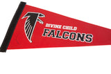 Close-up of the black falcon graphic and lettering on the red felt pennant.