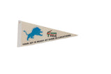 Vintage Jet's Pizza felt flag pennant with a blue lion and text on a cream background.