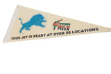 Angled view of the vintage Jets Pizza pennant logos and printed text.