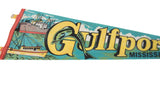 Illustrated dolphin and harbor scene on the vintage Gulfport felt pennant.
