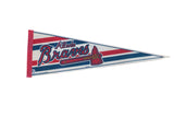 Vintage Atlanta Braves felt pennant with red, white, blue stripes and team logo, 9x27 inches.