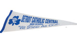 Angled view of white felt Detroit Catholic Central pennant with blue logo and text.