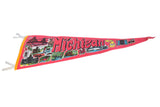 Vintage Michigan felt pennant displaying vibrant red color, colorful state landmarks, and white ties.