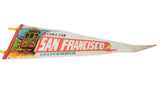 Vintage felt pennant showing aged San Francisco cable car illustration and text.