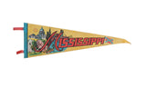 Vintage Mississippi felt flag pennant in yellow with red lettering and colorful state-themed graphics.