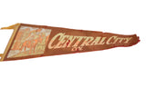 Angled view of the vintage Colorado pennant's graphic and cracked, time-worn felt texture.