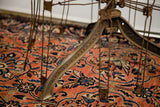 Close-up of rusted industrial metal skirt form foot, showing 