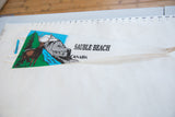 Vintage Sauble Beach pennant measured against a ruler confirming its 25-inch length.