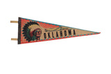 Vintage Oklahoma felt pennant with a chief graphic, black lettering, and red and teal trim.