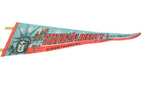 Triangular pennant with Statue of Liberty graphic, red text, and light blue stars.