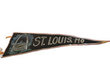 St. Louis, MO felt pennant detail, white lettering, Gateway Arch, and red braided edge.