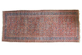 Antique Persian Bakshaish kelleh rug with an allover herati design in rust red, blue, and brown, measuring 5' x 13'.