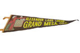Alexander Lake Lodge felt pennant, showcasing the scenic graphic and yellow text.