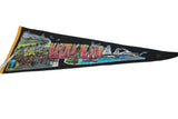 Angled view of the vintage Mackinac Island felt pennant, with its vibrant illustrated graphics.