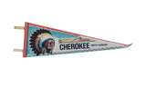 Vintage 1970s Cherokee North Carolina felt pennant with a chief's portrait and graphic border.