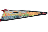 Angled view of a vintage Niagara Falls pennant showing the vibrant graphic and red ties.