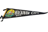 Vintage Mackinaw City felt pennant's left end, showing Mackinac Bridge illustration and white text.