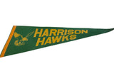 Vintage Harrison Hawks pennant with bold gold lettering on green felt fabric.