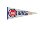 Vintage Detroit Pistons felt flag pennant from the 2000s with its classic red and blue logo.