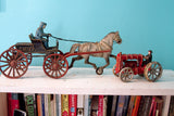 Vintage cast iron Chief horse and buggy, red Fordson tractor collectible toys.
