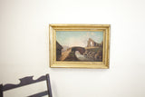 Ruined archway and soft sky in the Victorian landscape painting with a distressed gold frame.