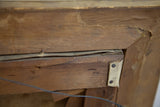 Vintage wooden painting frame backing, showing corner reinforcement and visible wear.