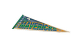 Dallas Mavericks vintage felt pennant displaying green and blue lettering with yellow accents.